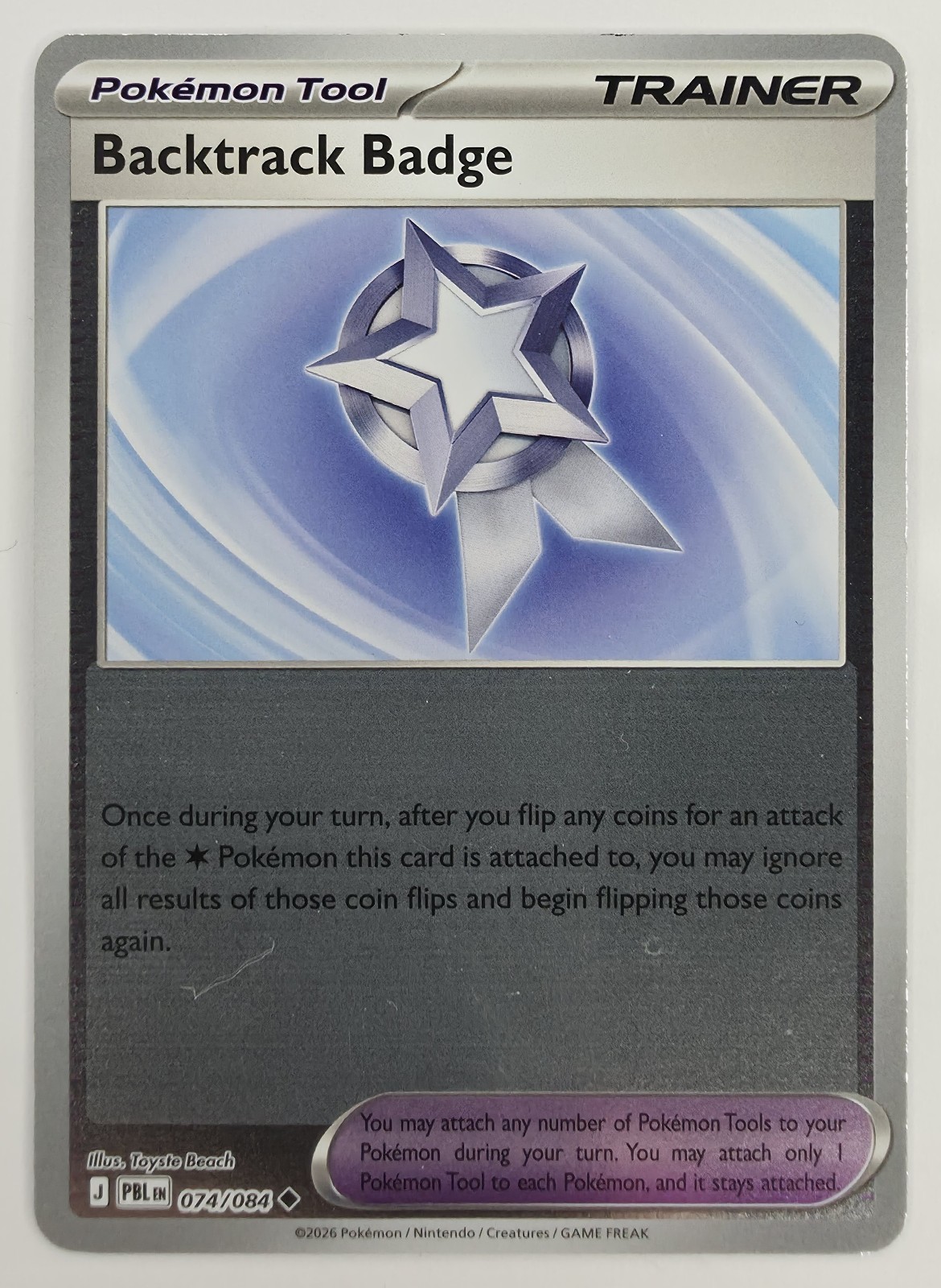 2026 Pokemon Pitch Black Backtrack Badge #074/084 Reverse Holo Uncommon Trainer front
