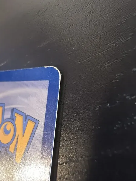 Charizard back top edge whitening close-up