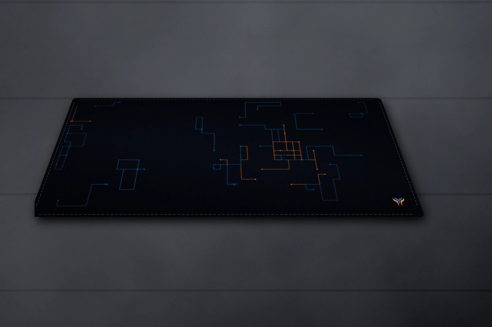 Elemental Circuit desk mat, 36 x 18 in, on a desk, angled