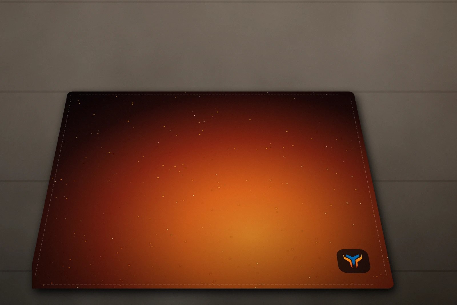 Elemental Forge desk mat, 18 x 16 in, on a desk, angled