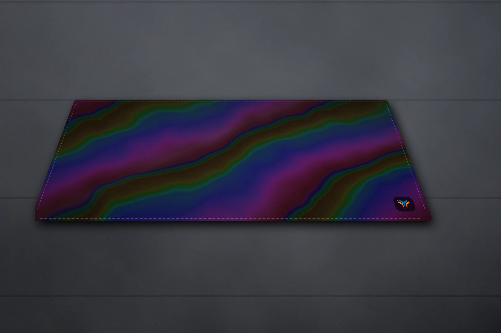 Elemental Holo desk mat, 16 x 32 in, on a desk, angled