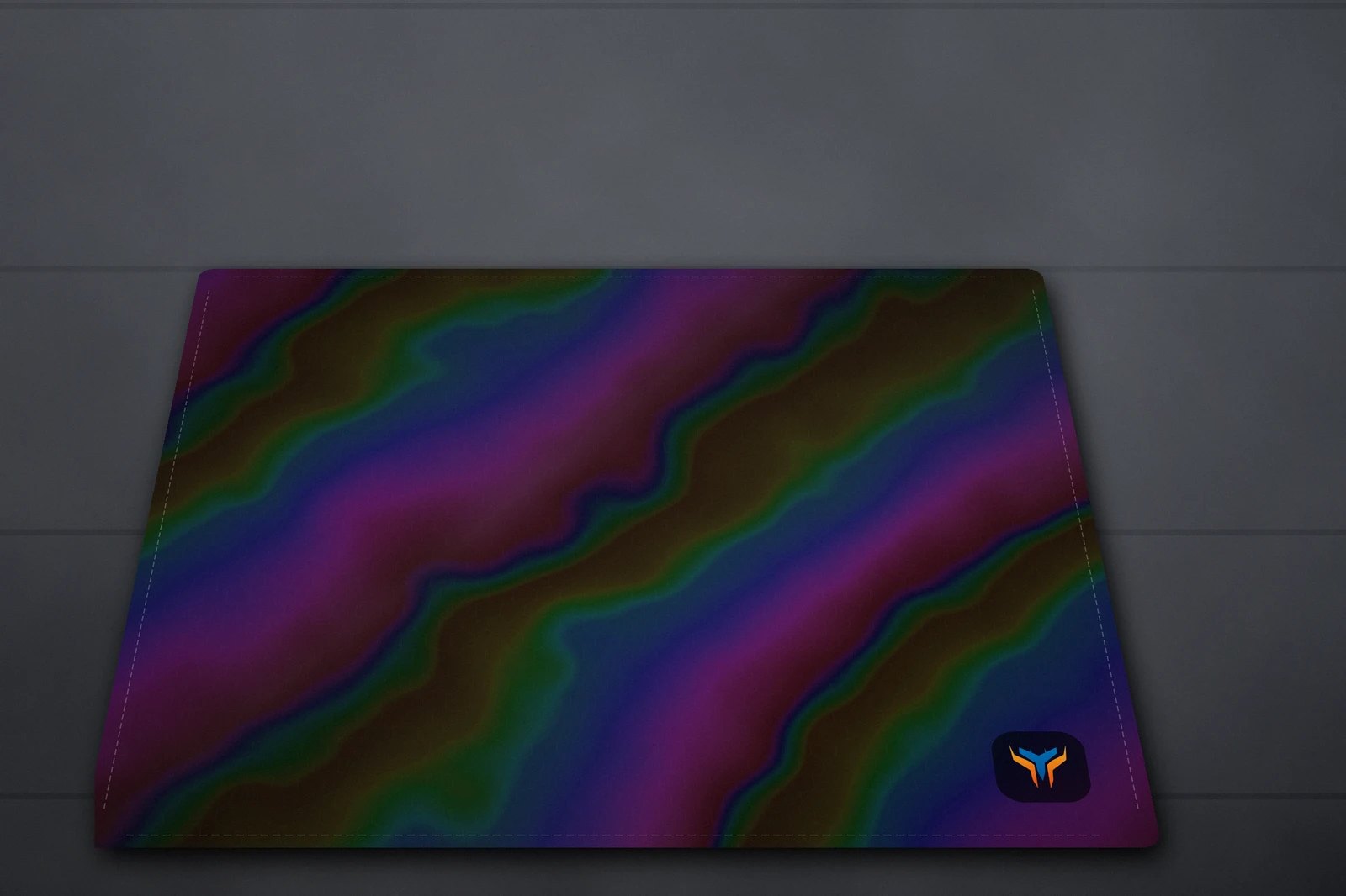 Elemental Holo desk mat, 18 x 16 in, on a desk, angled