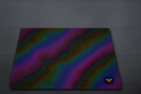 Elemental Holo desk mat, 18 x 16 in, on a desk, angled