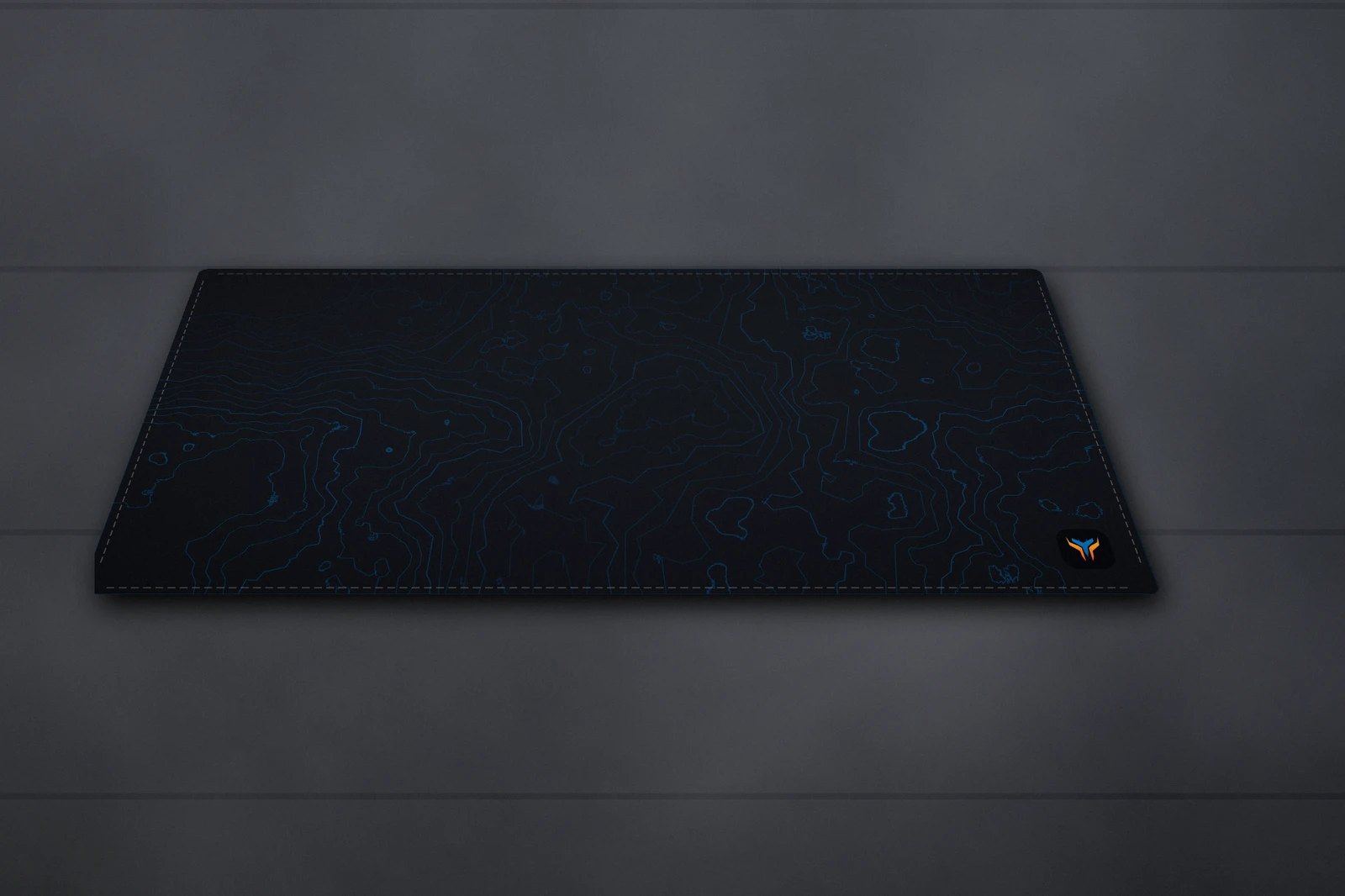 Elemental Topo desk mat, 16 x 32 in, on a desk, angled