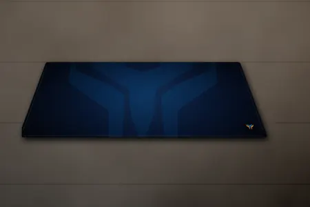 Elemental Wing desk mat, 16 x 32 in, on a desk, angled