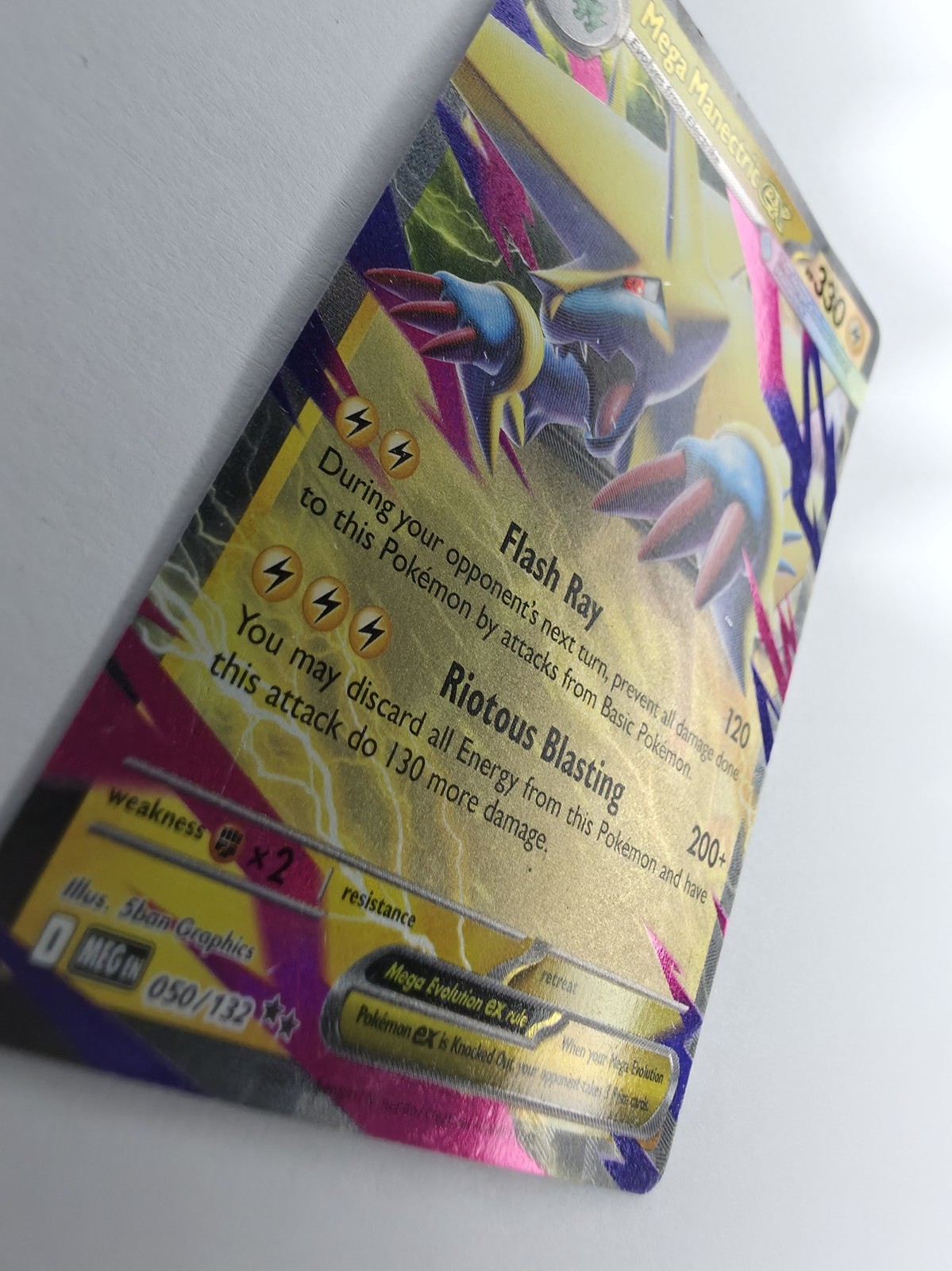 Mega Manectric ex holo angle