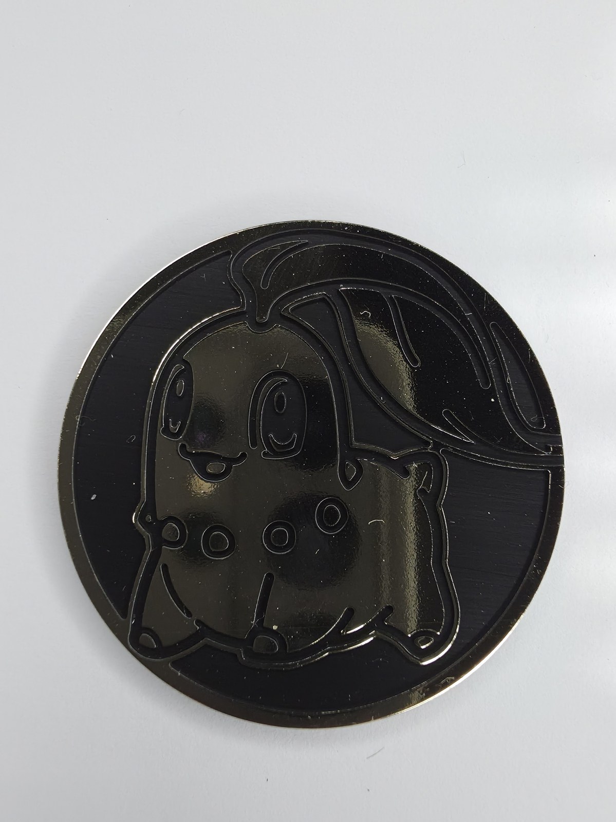 Chikorita coin front