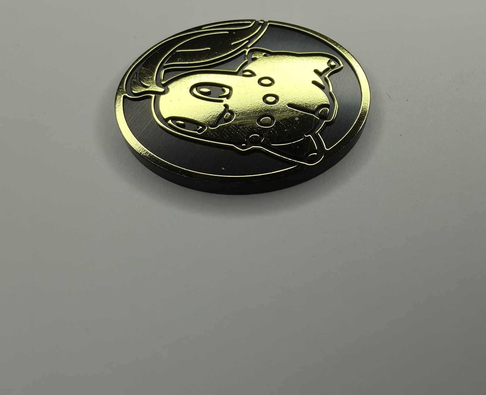 Chikorita coin front, angled