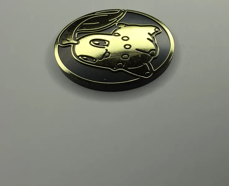 Chikorita coin front, angled