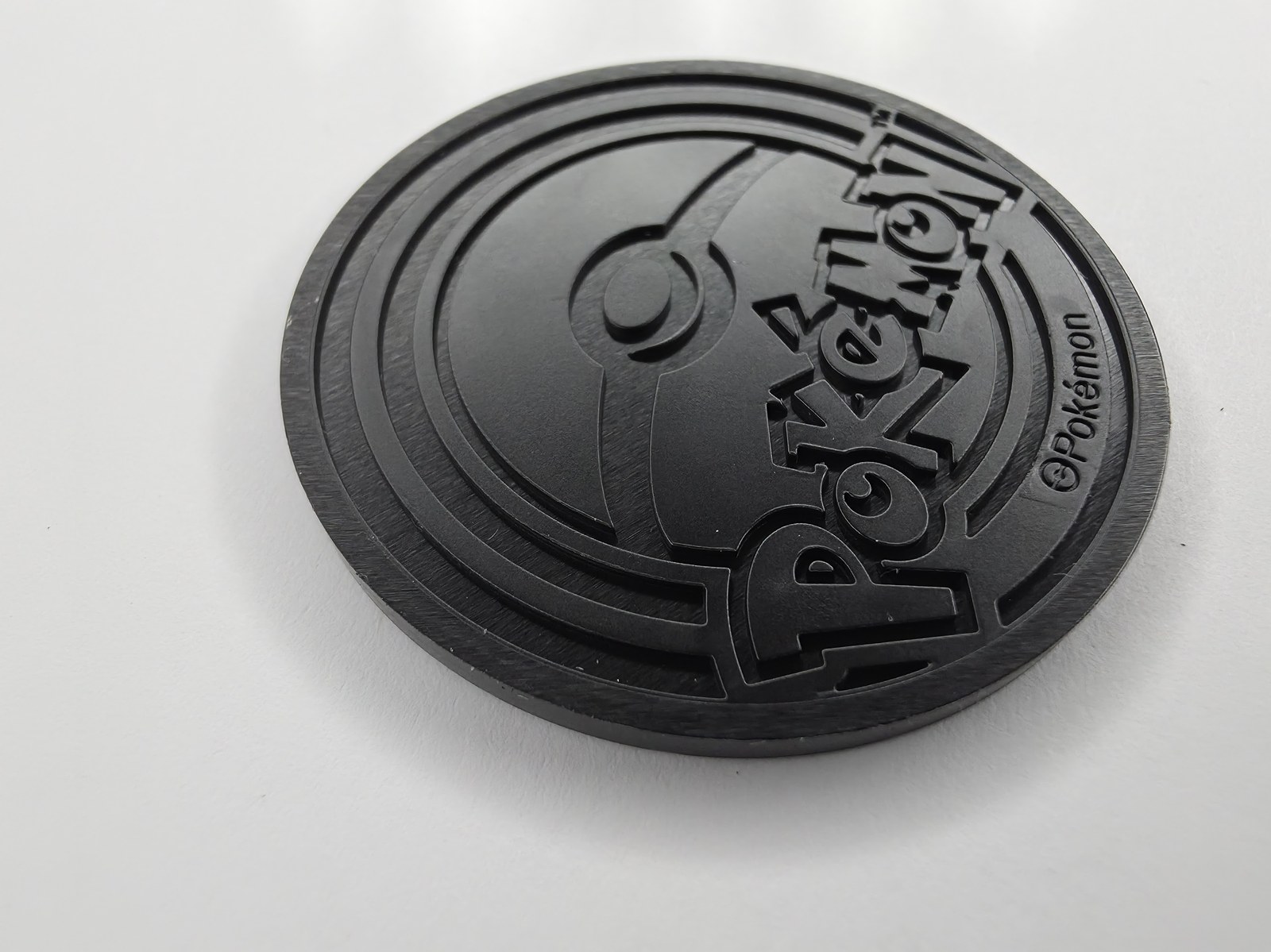 Chikorita coin back, angled