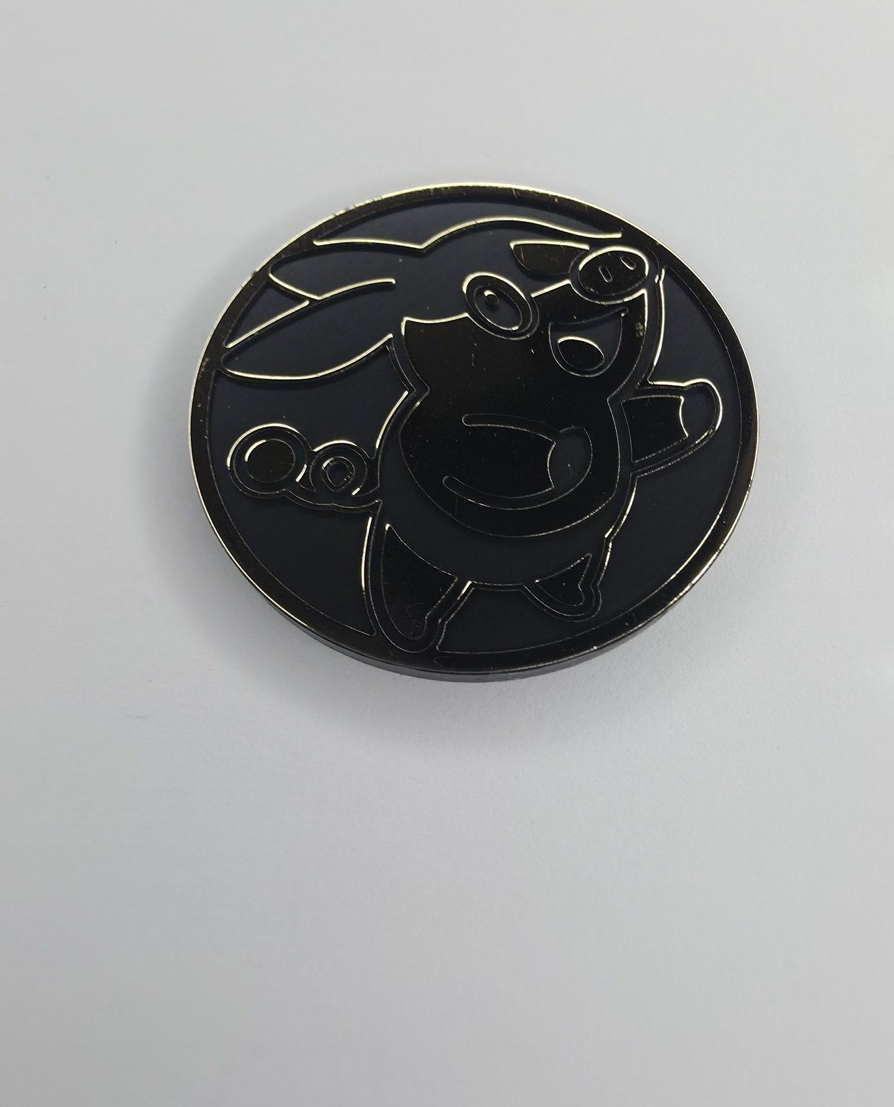 Tepig coin front