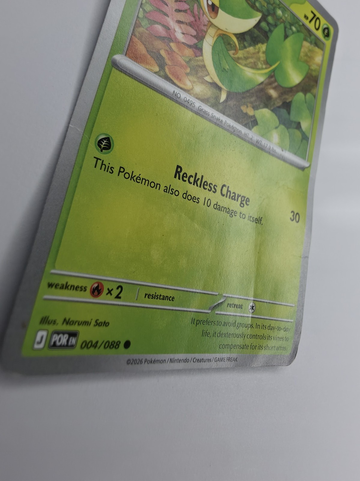 2026 Pokemon Perfect Order Snivy #004/088 crease, angled