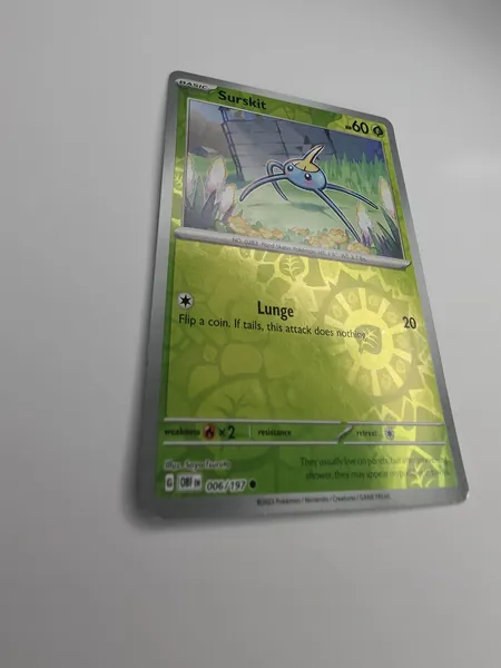 2023 Pokemon Obsidian Flames Surskit #006/197 Reverse Holo front, angled